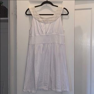 White dress with gold accent neckline